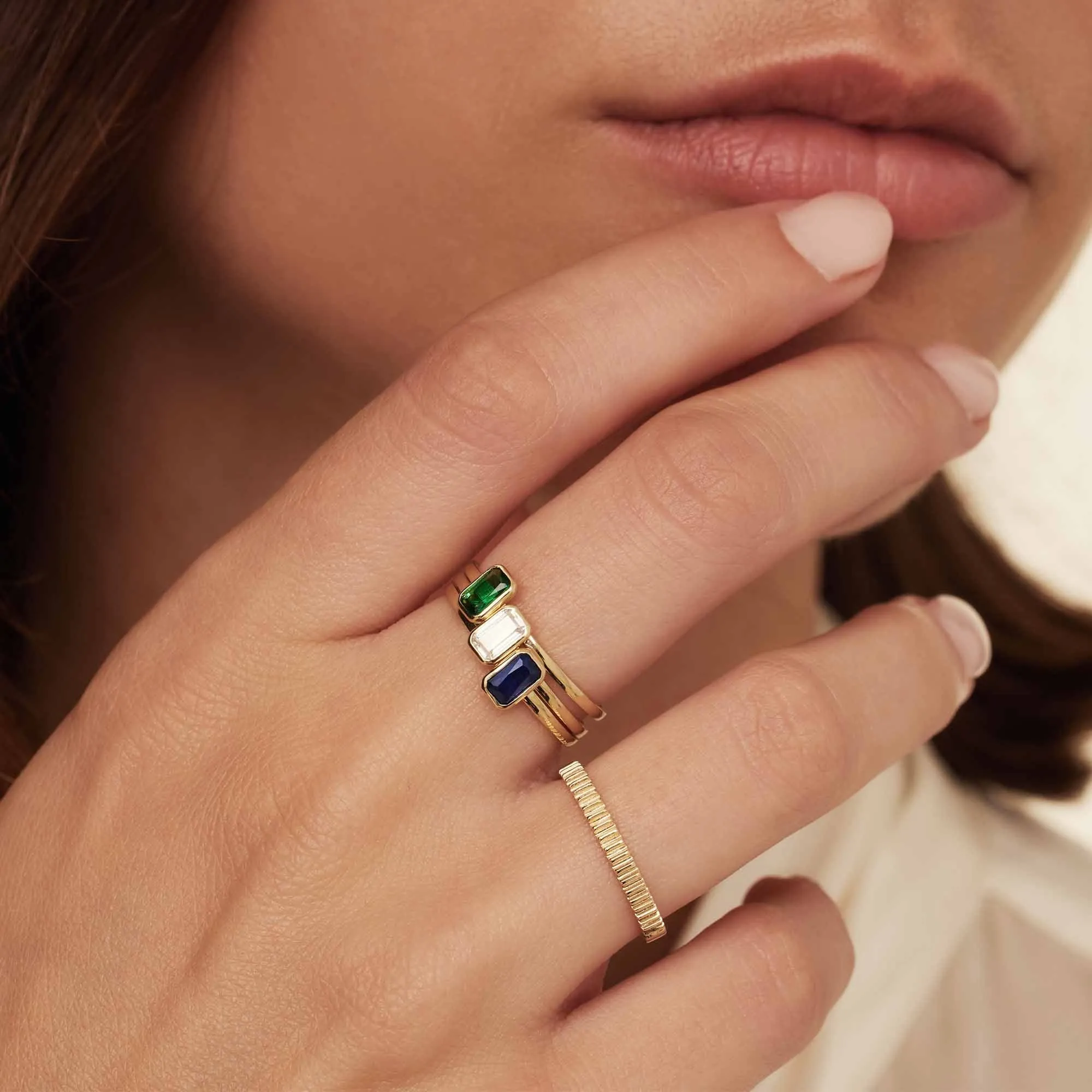 Baguette Nila 14 karat gold ring with blue zirconia stone