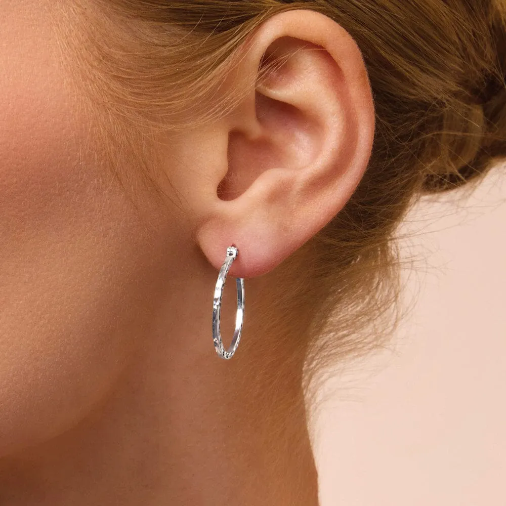 Diamond Cut Hoop Earrings in Sterling Silver