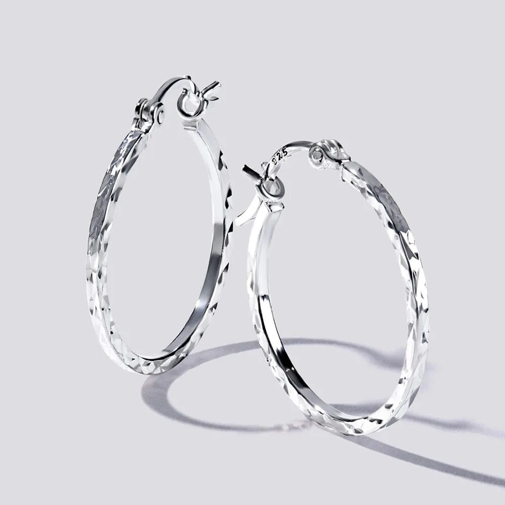 Diamond Cut Hoop Earrings in Sterling Silver