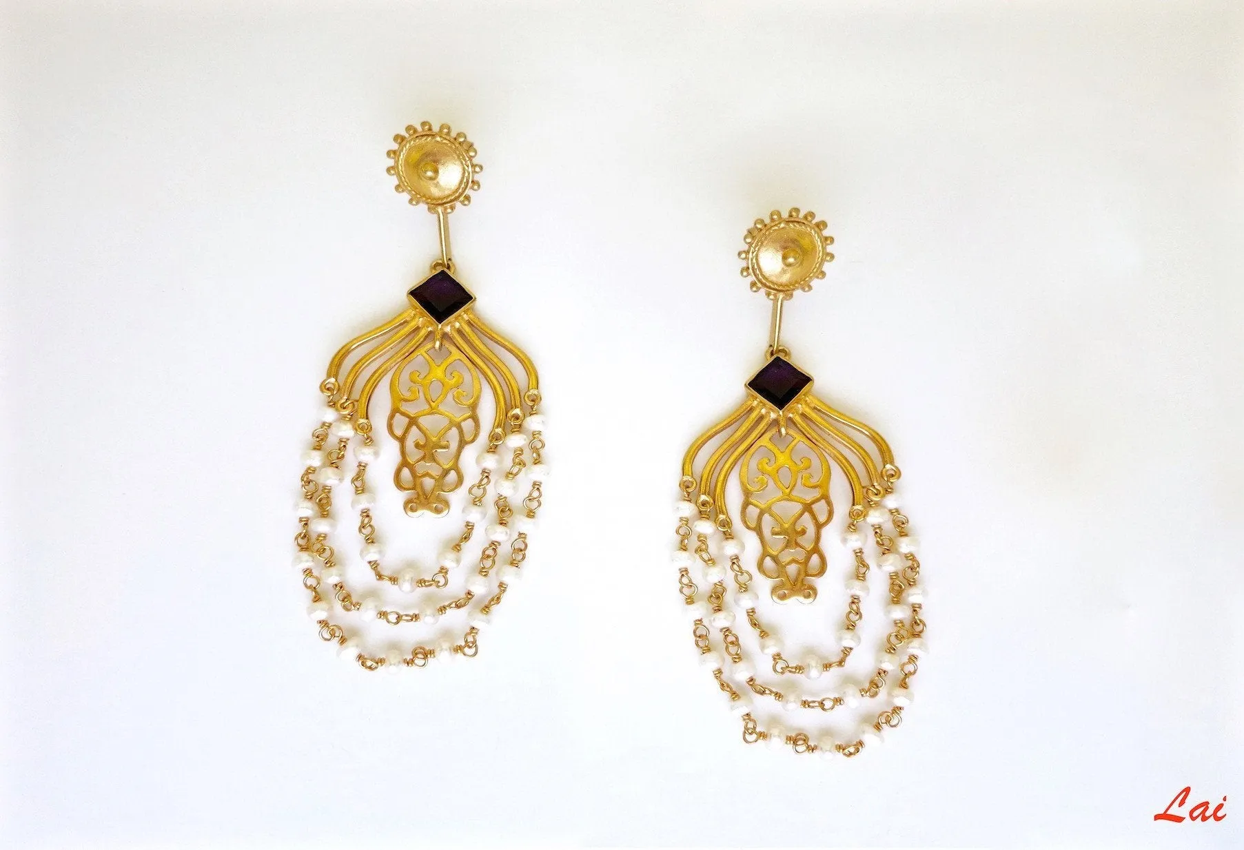 Gold-plated, draping pearls chandelier earrings