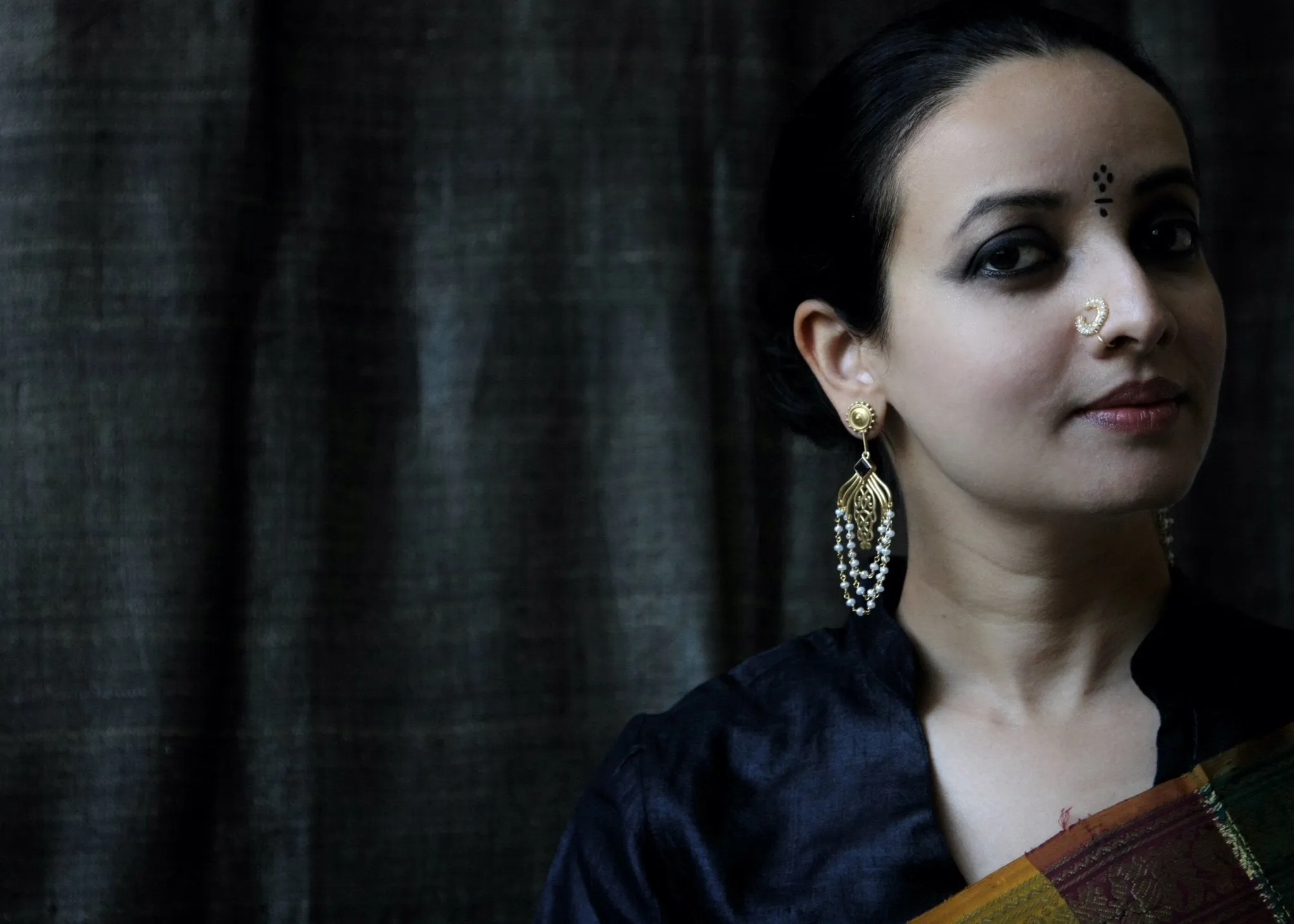 Gold-plated, draping pearls chandelier earrings