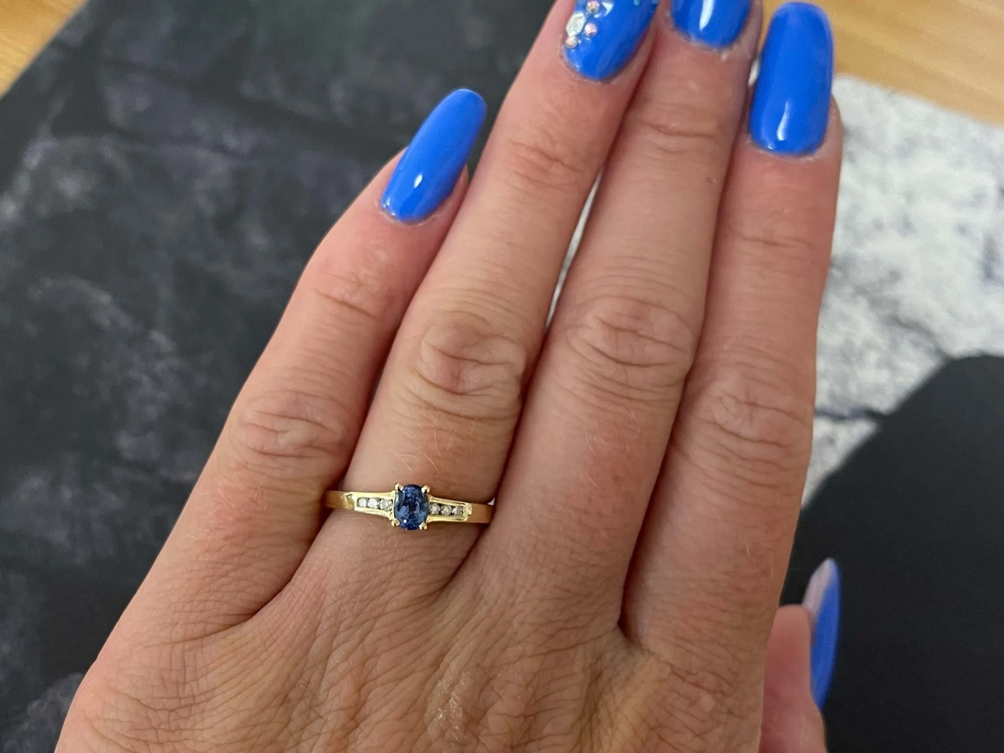 Light Vibrant Blue Sapphire Channel Set Diamond Ring in 14k Yellow Gold
