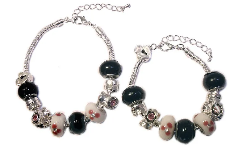 Mother's Bracelets:   European style Bracelets, with pinks, white and black lampwork beads