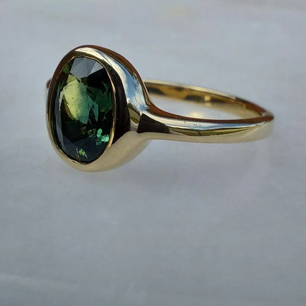 Natural Green Australian Parti Sapphire gold solitaire ring