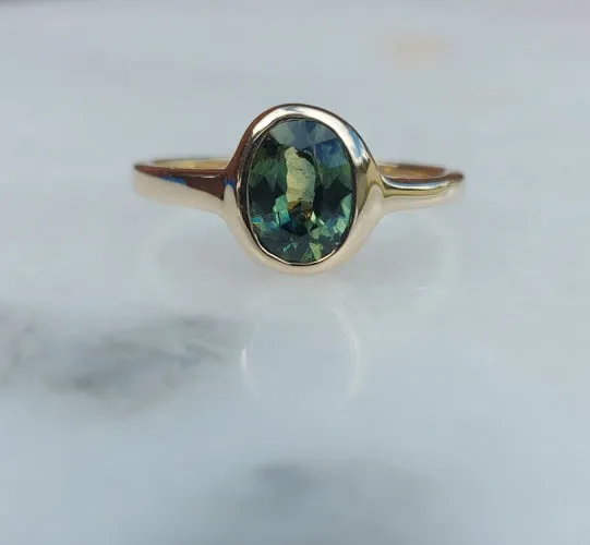 Natural Green Australian Parti Sapphire gold solitaire ring