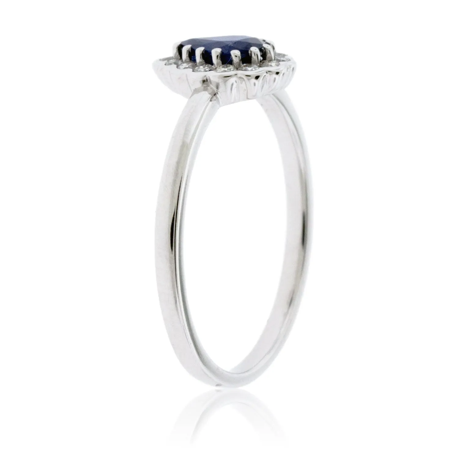 Pear-Shaped Blue Sapphire and Diamond Halo Ring