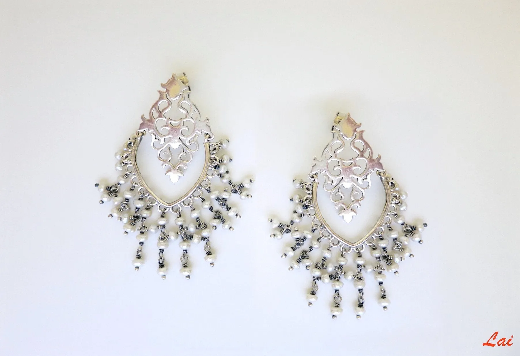 Ravishing, pearl-fringed chandelier earrings
