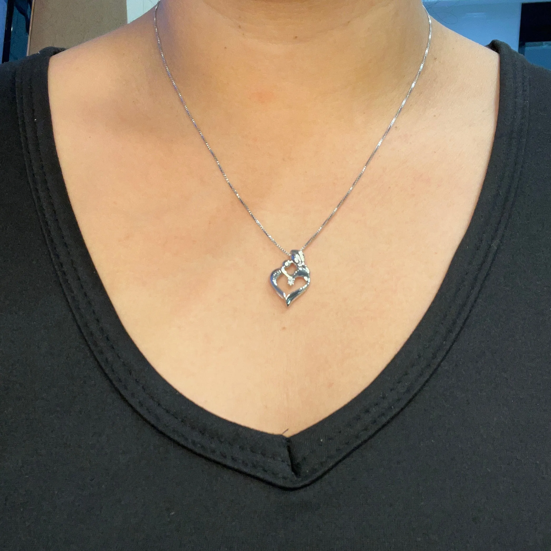 Sterling Silver (0.01ct) Canadian Diamond Mother and Child Pendant