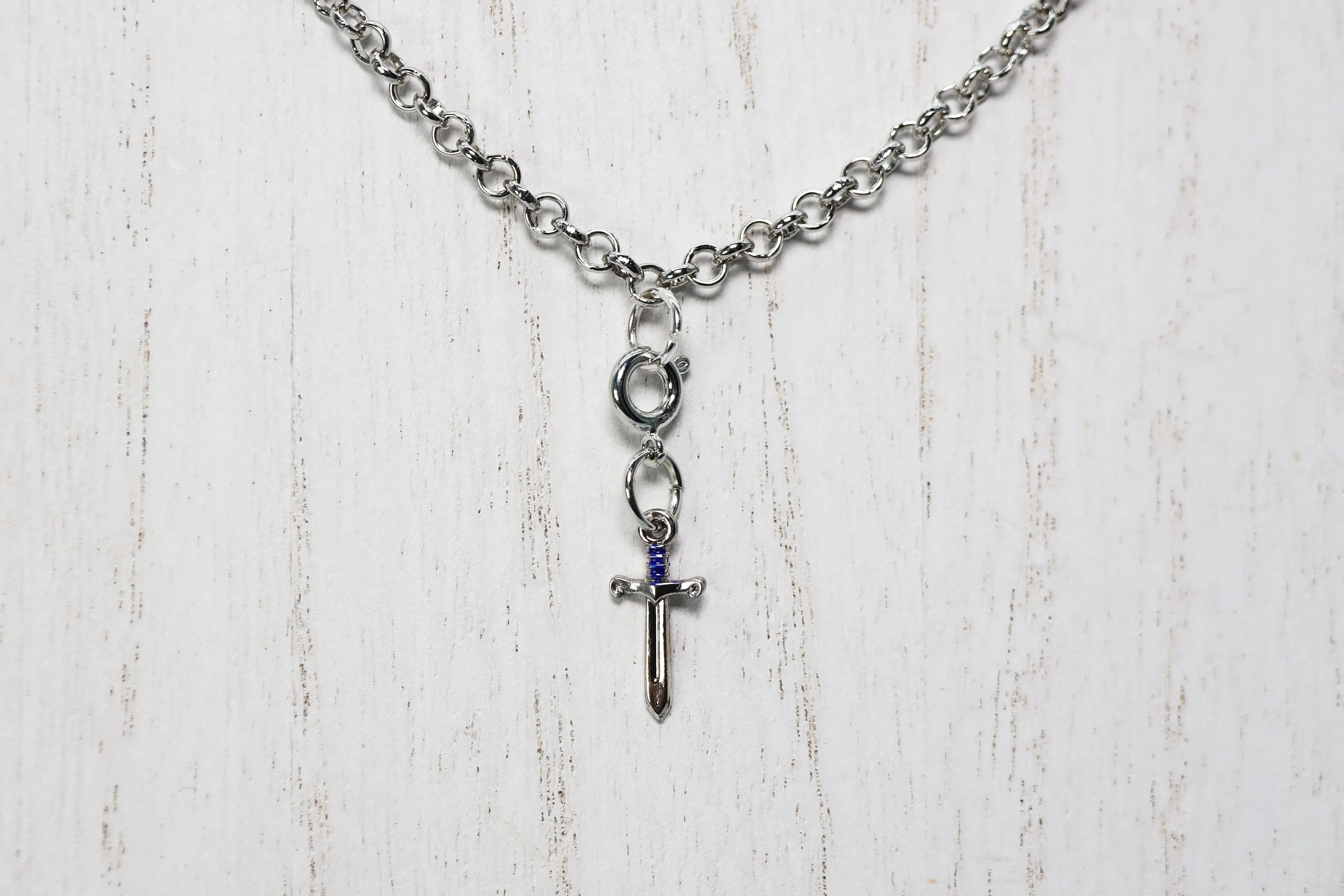 Traveler's Trinkets: Sword Charm